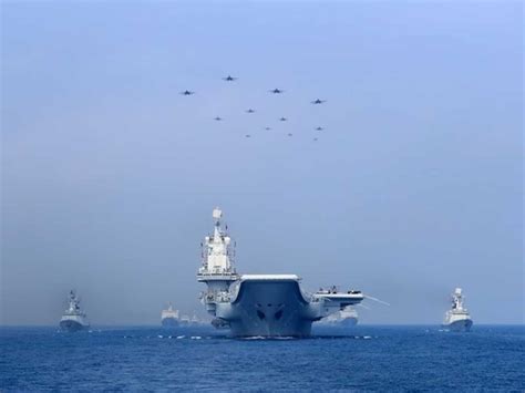 China sends large group of warplanes, navy ships towards Taiwan in forceful display